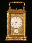 D357 A finely engraved and early bell striking and repeating gorge carriage clock (France)