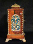 small rosewood bell striking clock with concealed handle by Alabone,1840..   (England)