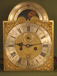 fine green lacquer longcase showing high water and phases of the moon. (England)