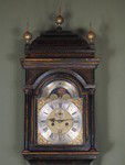 fine green lacquer longcase showing high water and phases of the moon. (England)