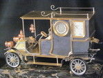 A rare automaton car clock by Guilmet,  (France)